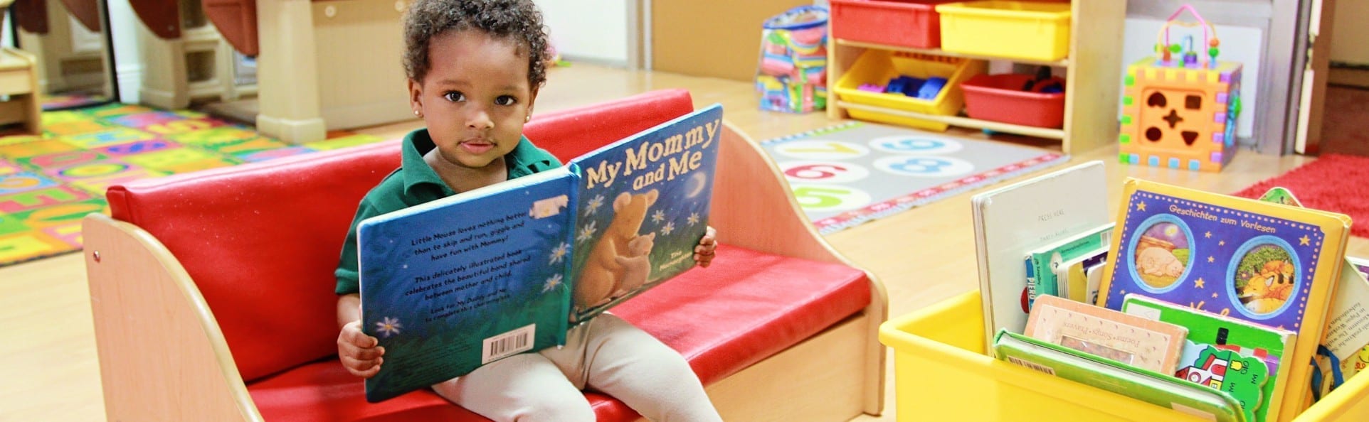 Kid Reading at the ICS Coral Gables Daycare